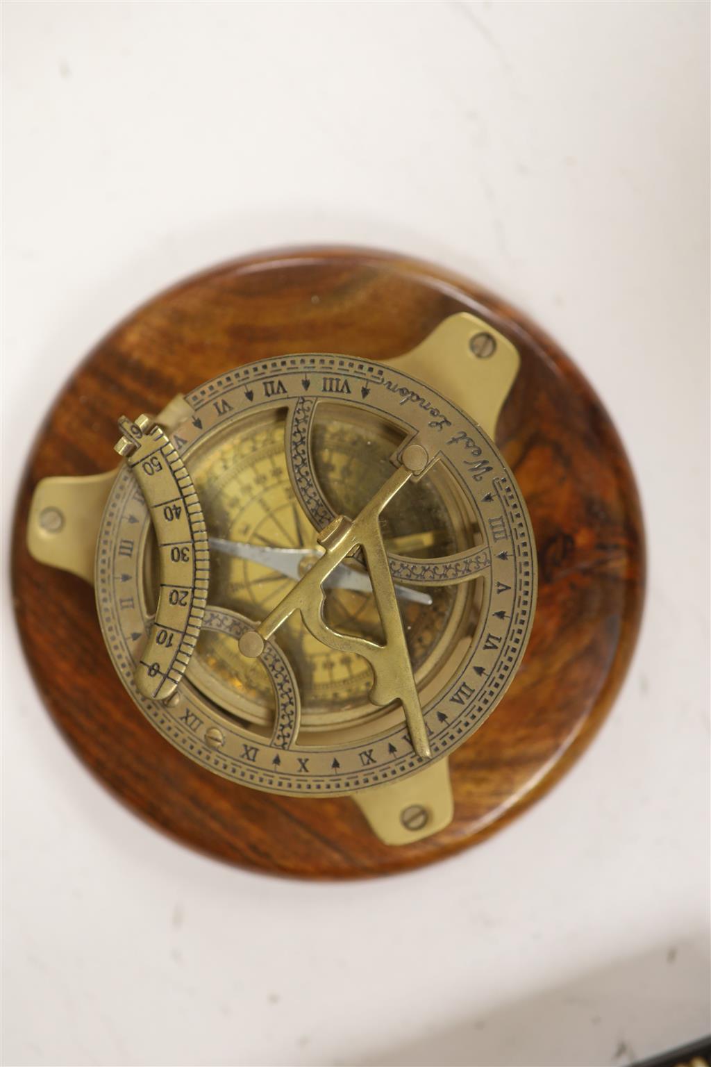Three table bells, a porcupine quill box, a table compass and a Royal Doulton babys plate
